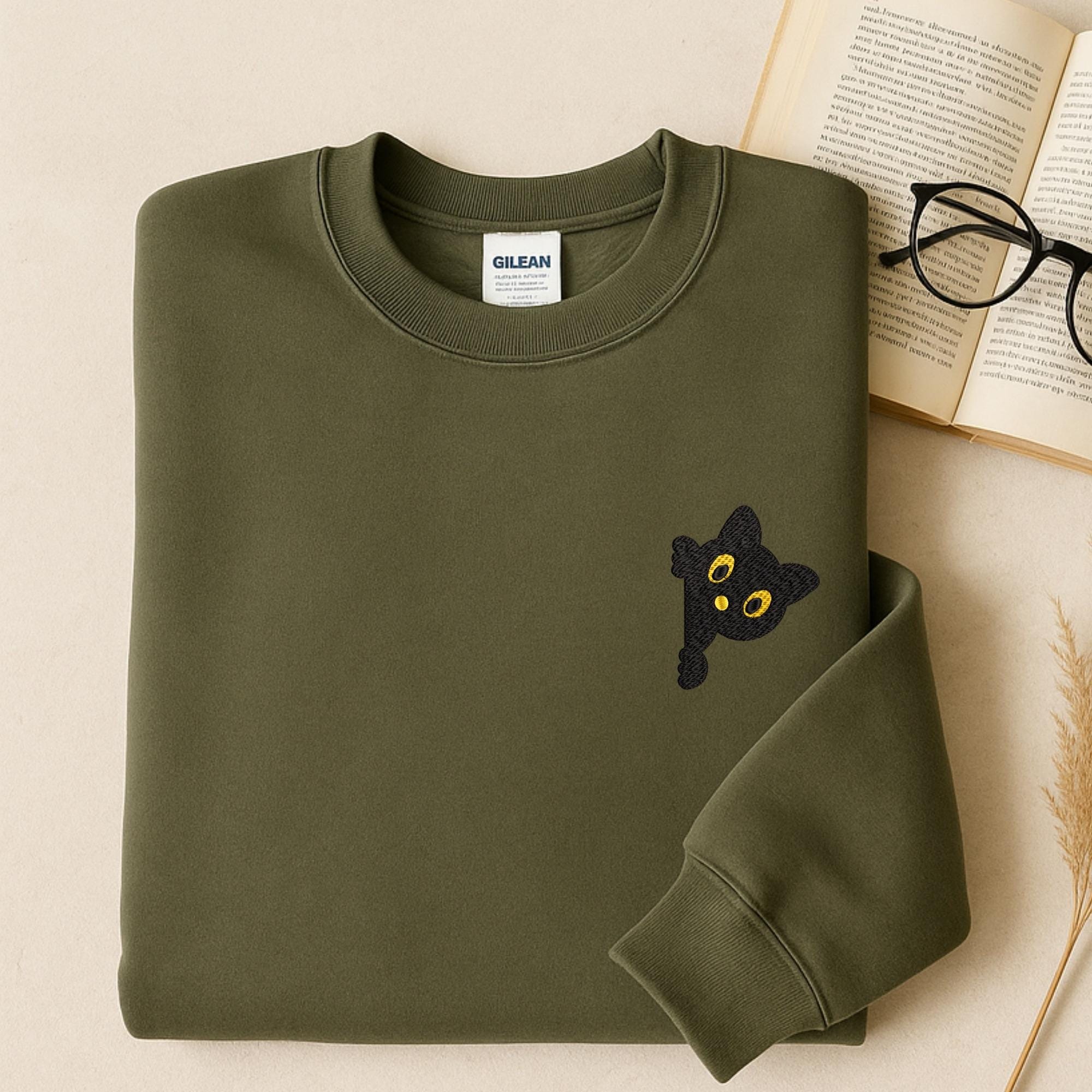 close-up preview of Peeking Black Cat Embroidery Design